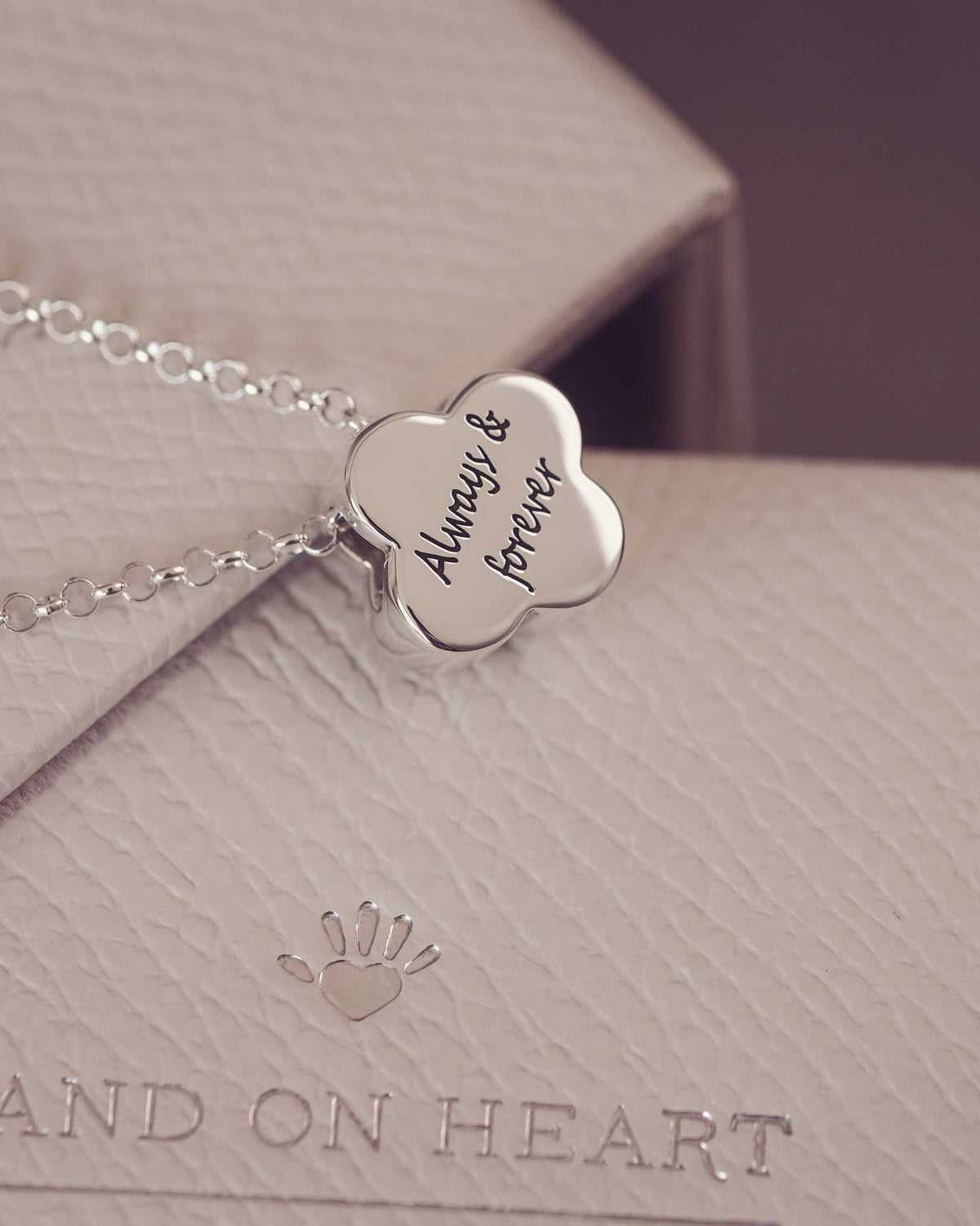 Silver necklace with 'Always & forever' pendant on a 'Hand on Heart' branded box.