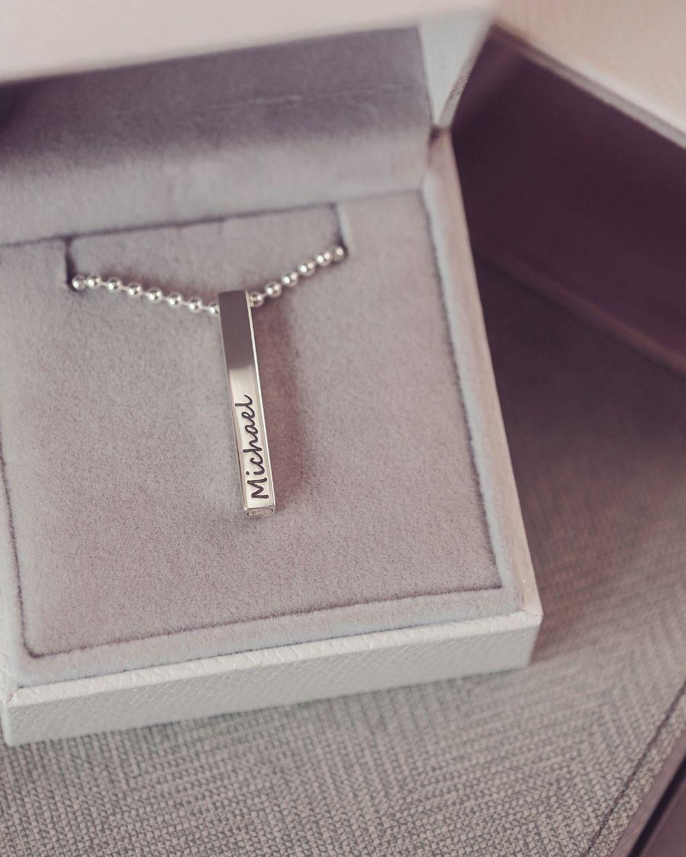 Silver necklace with a pendant in a jewelry box