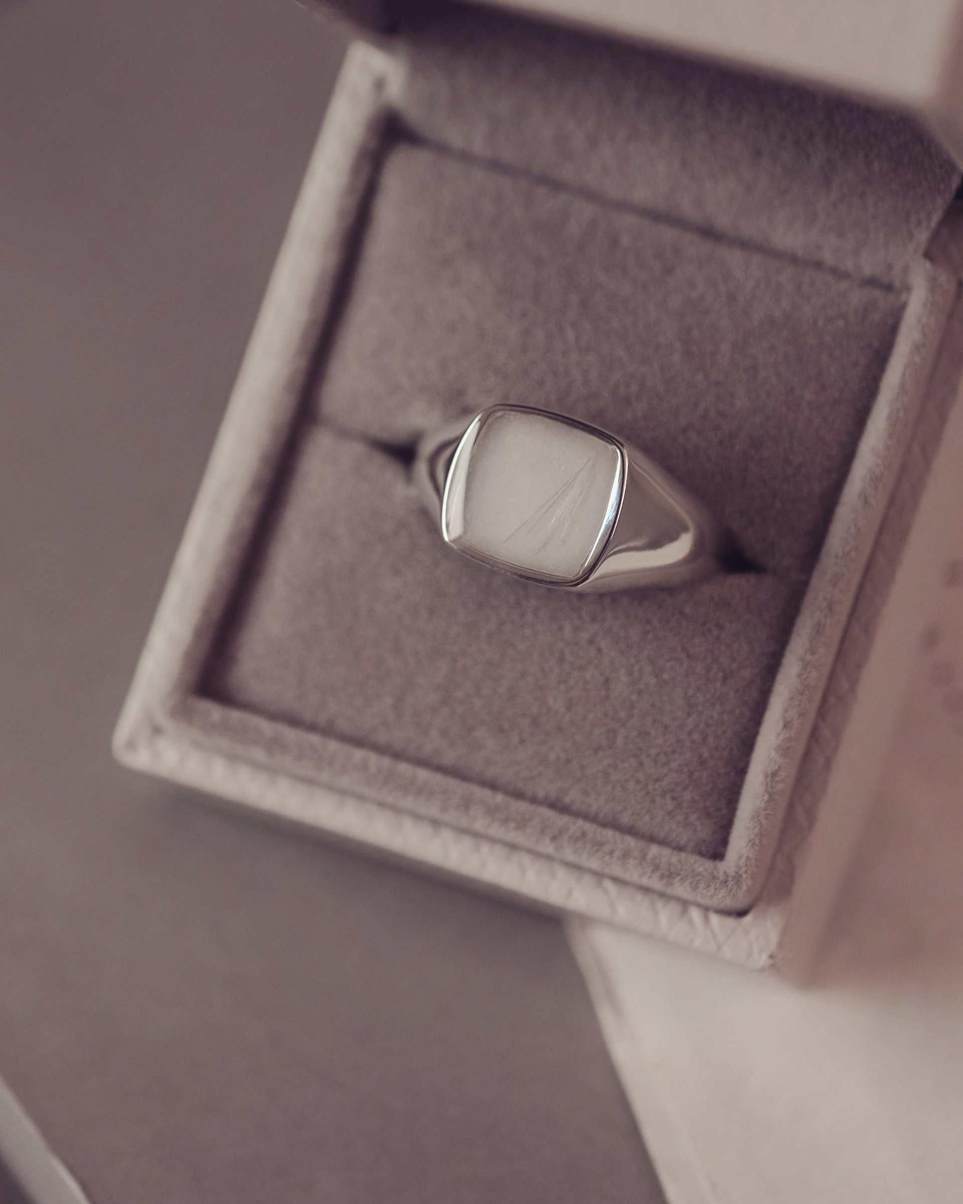 Cushion signet ring in a jewellery box