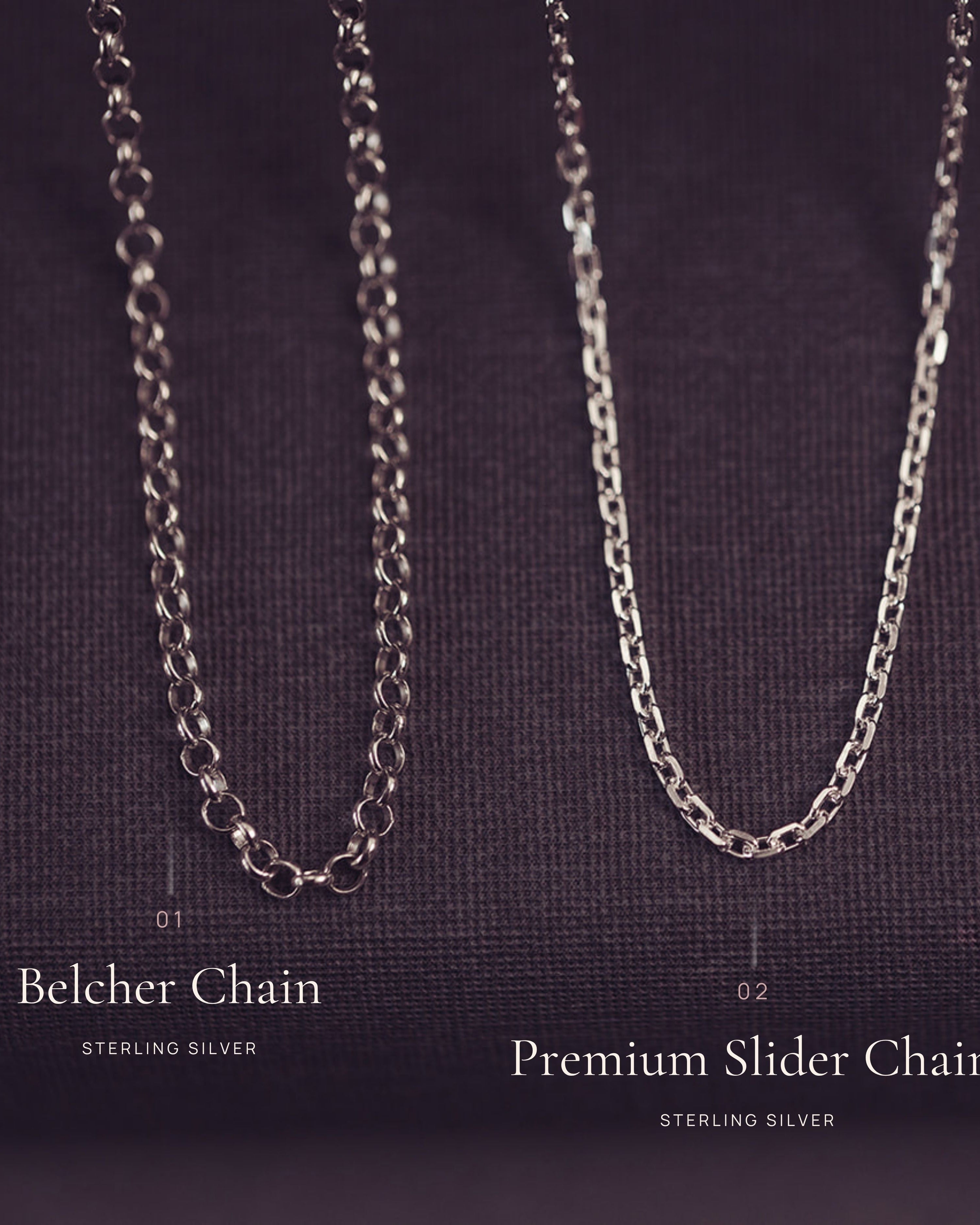 Two silver chains, a Belcher chain and a Premium Slider chain, on a dark background.