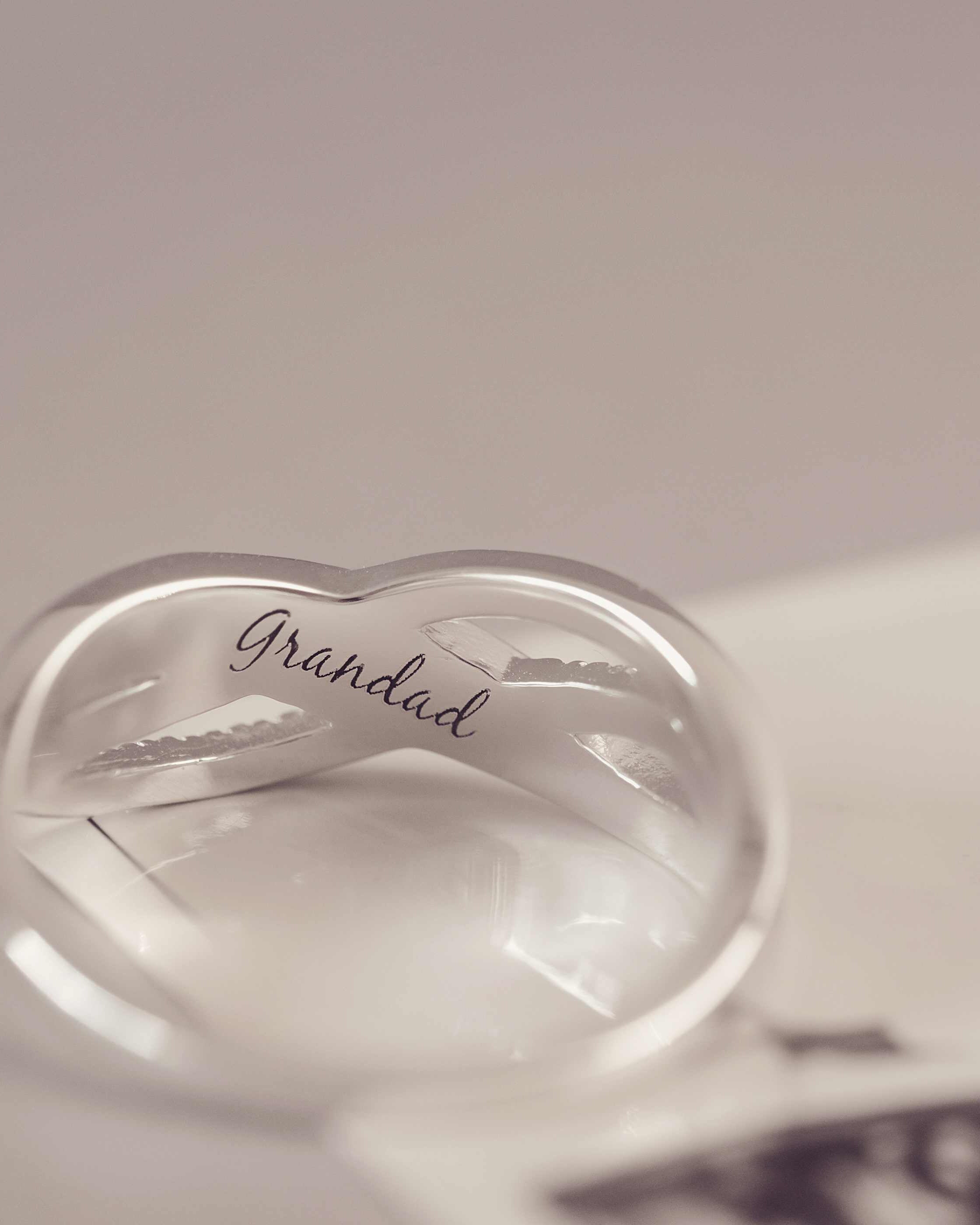 Silver ring with the engraving Grandad