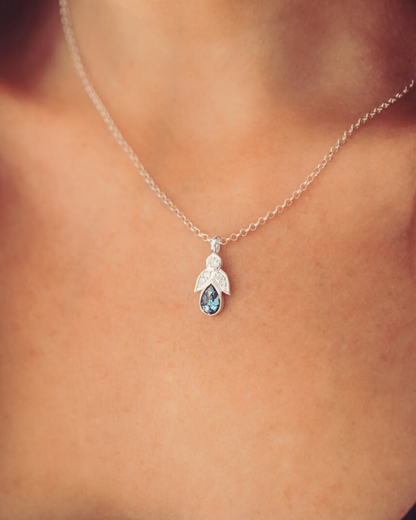 Sterling Silver Angel Pendant, containing cremation ashes and blue crystal