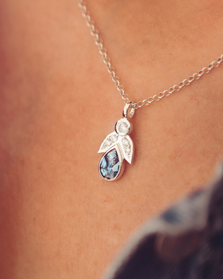 Sterling Silver Angel Pendant, containing cremation ashes and blue crystal