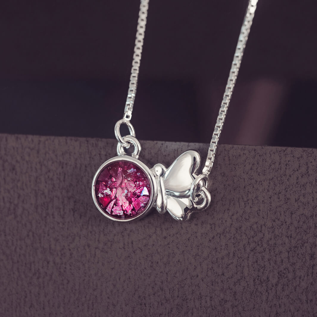 Silver Butterfly Necklace on a chain, filled with pink crystals, resin and cremation ashes