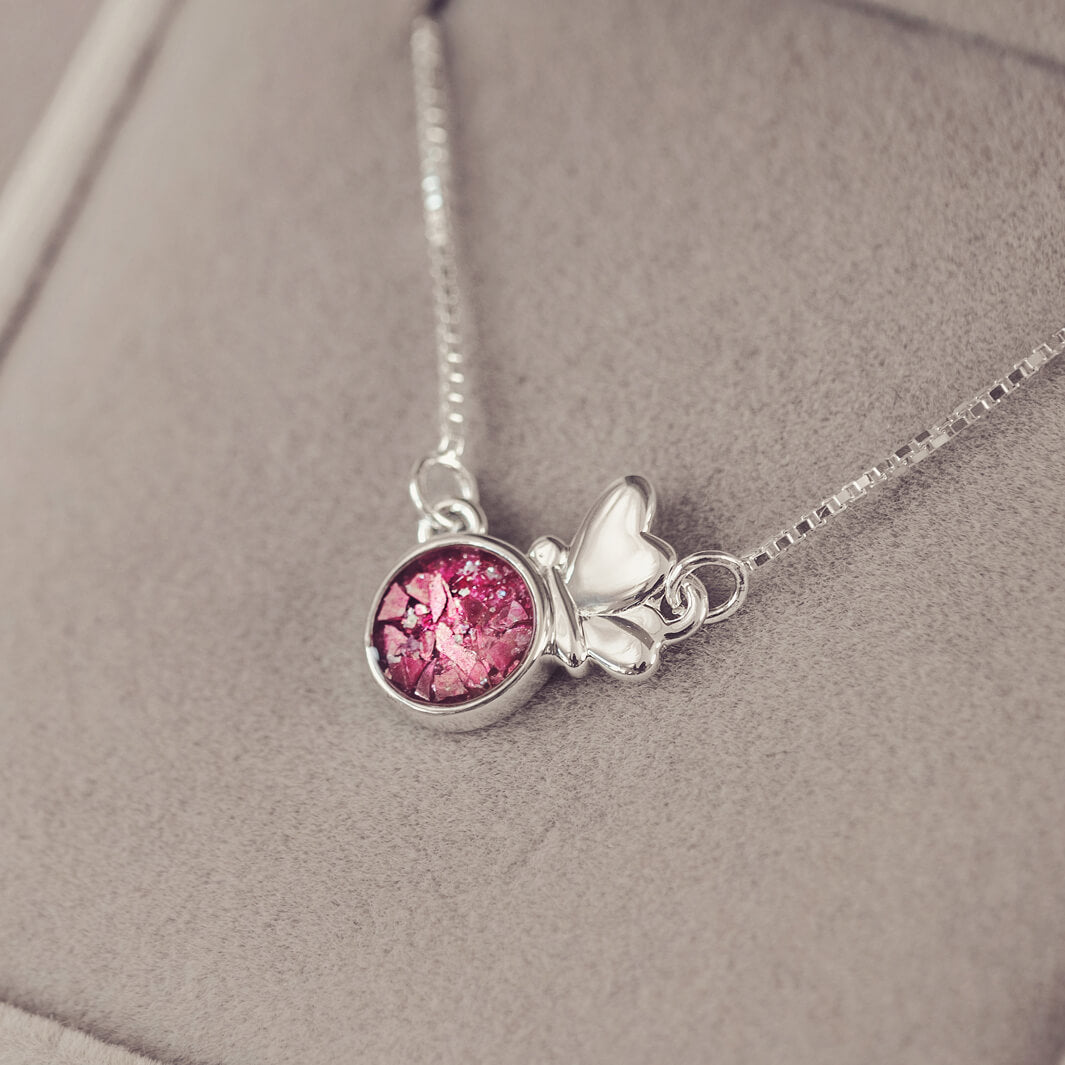Silver Butterfly Necklace on a chain, filled with pink crystals, resin and cremation ashes