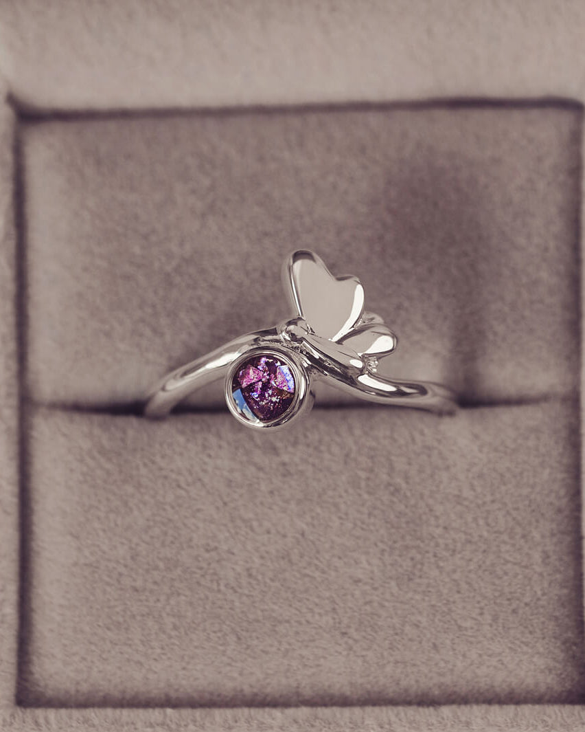 sterling silver butterfly necklace with a purple gemstone, created using cremation ashes