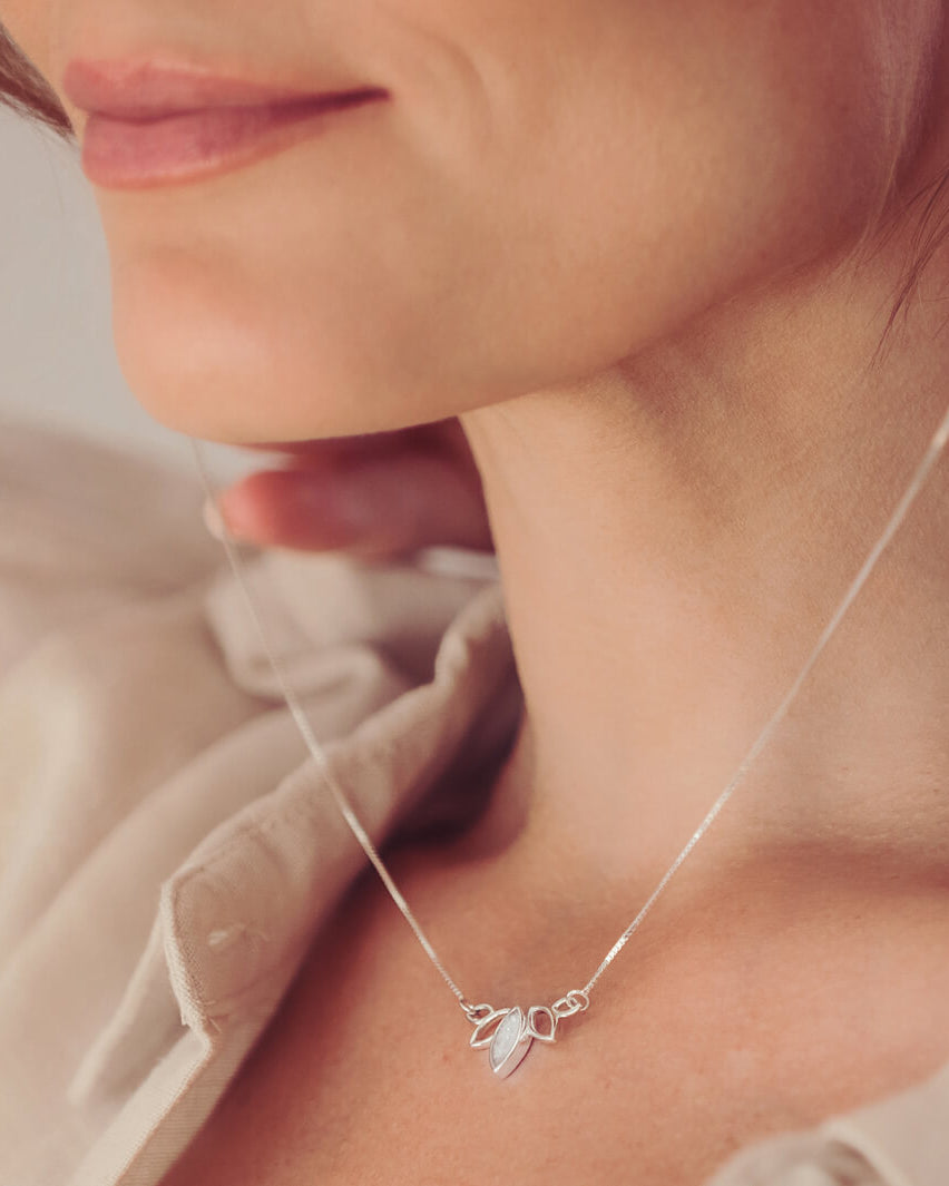 Cremation Ashes Eternal Marquise Necklace, on a silver chain, worn on a ladies neck
