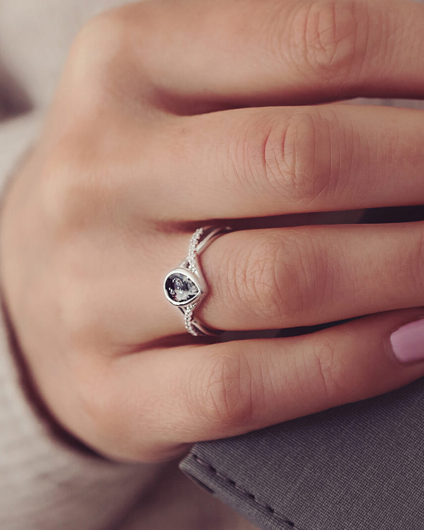 Sterling Silver Peardrop Ring with Crystals on the Band, holding cremation ashes and black crystal