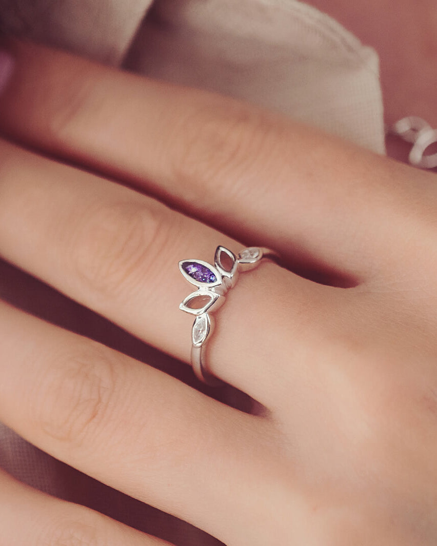 Cremation Ashes Marquis Style Ring, in purple, being worn on a ladies hand
