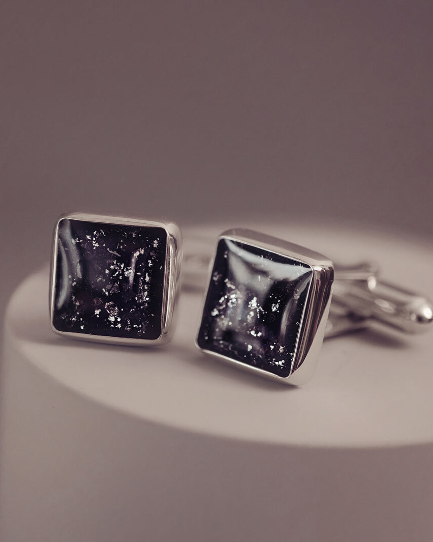 Square silver cufflinks containing cremation ashes, black crystal and resin
