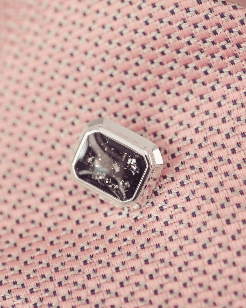 silver tie pin, created with black crystals, resin and cremation ashes.