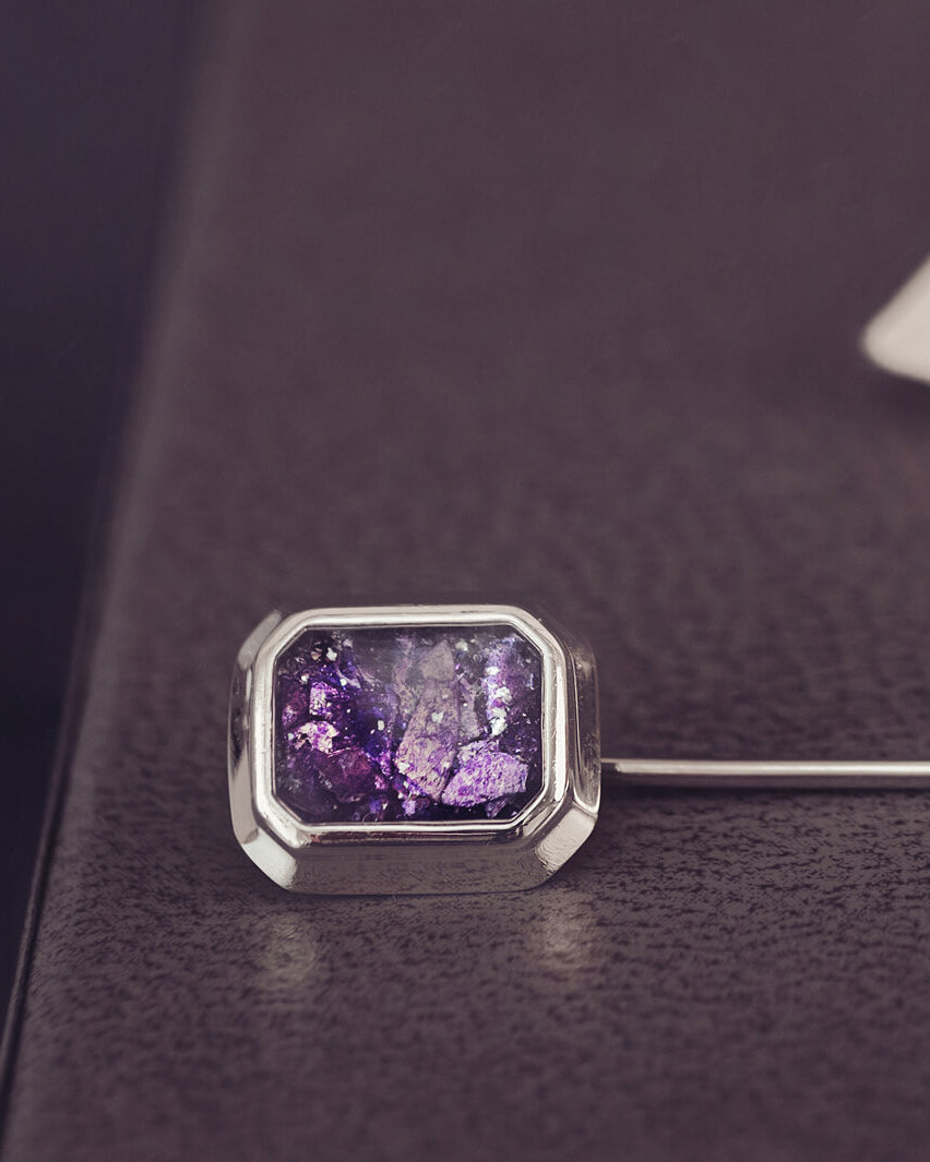 silver tie pin, created with purple crystals, resin and cremation ashes.
