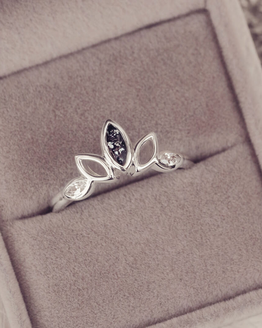 Sterling Silver Ring, created with your loved ones ashes, with Cubic Zircona gemstones. Black floating crystals with in piece in a grey jewellery box