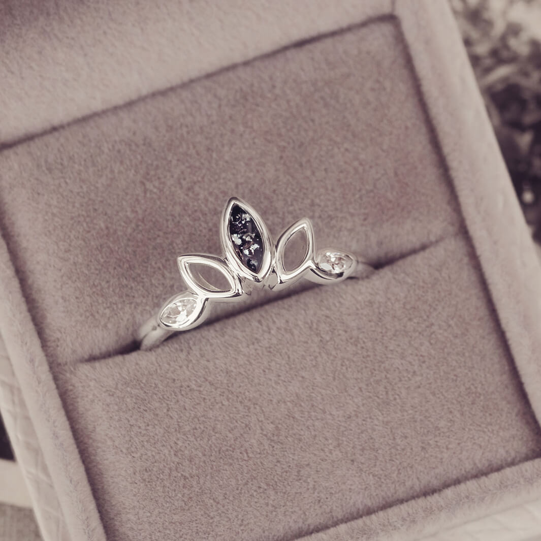 Sterling Silver Ring, created with your loved ones ashes, with Cubic Zircona gemstones. Black floating crystals with in piece in a grey jewellery box