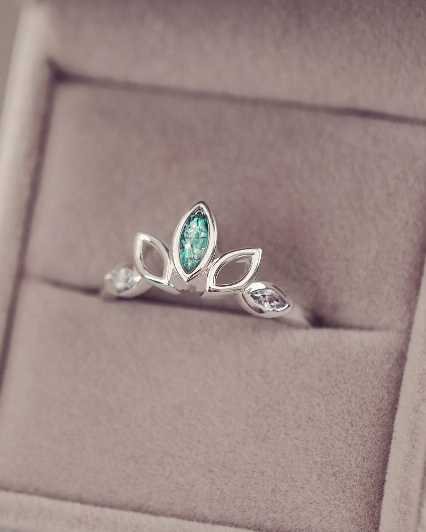 Sterling Silver Ring, created with your loved ones ashes, with Cubic Zircona gemstones. Green floating crystals with in piece in a grey jewellery box