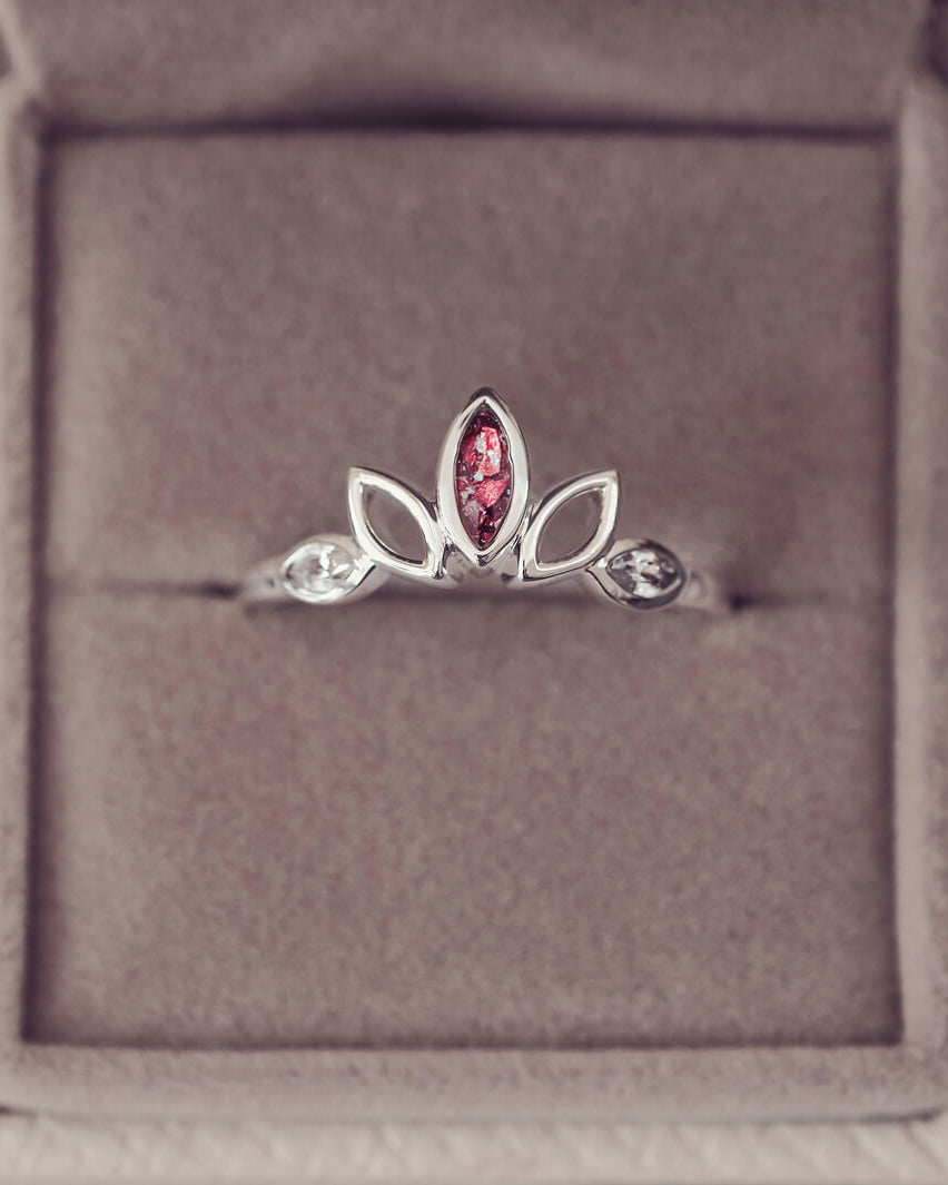 Sterling Silver Ring, created with your loved ones ashes, with Cubic Zircona gemstones. Red floating crystals with in piece in a grey jewellery box