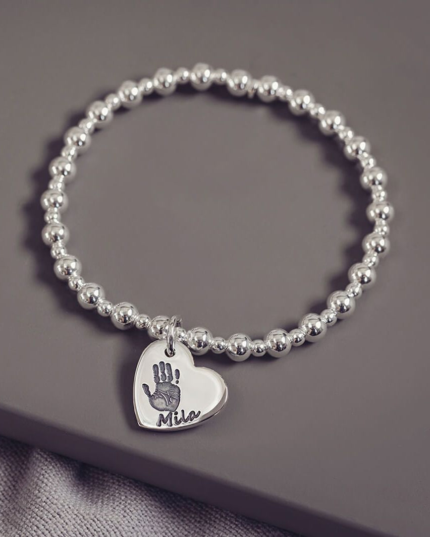 handprint silver charm bracelet