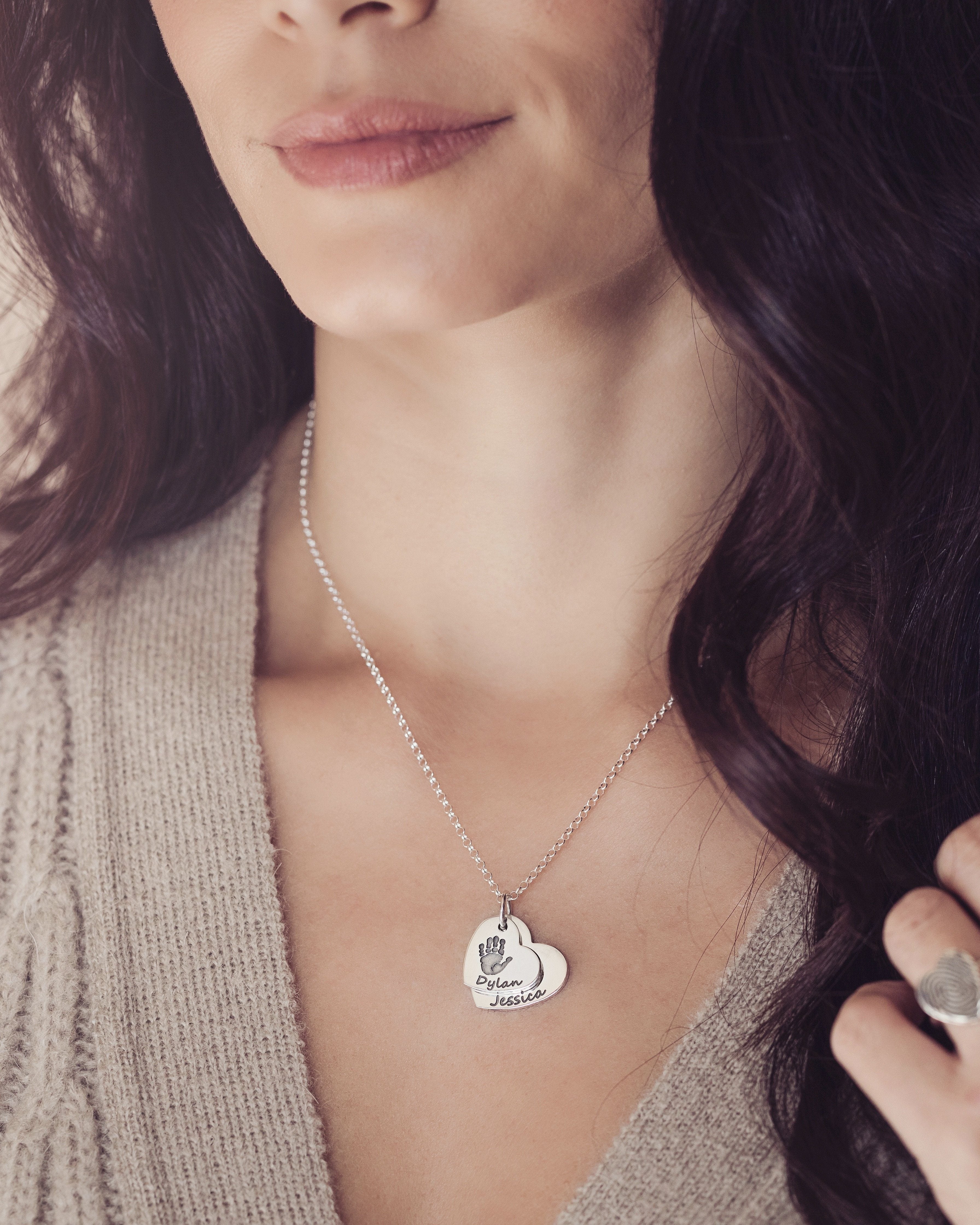 descending handprint necklace