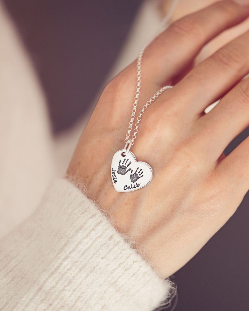 Handprint necklace for two children