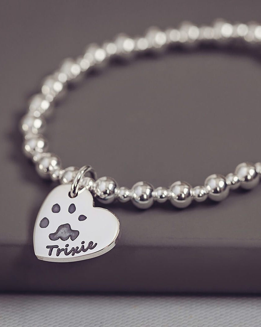 paw print silver charm bracelet