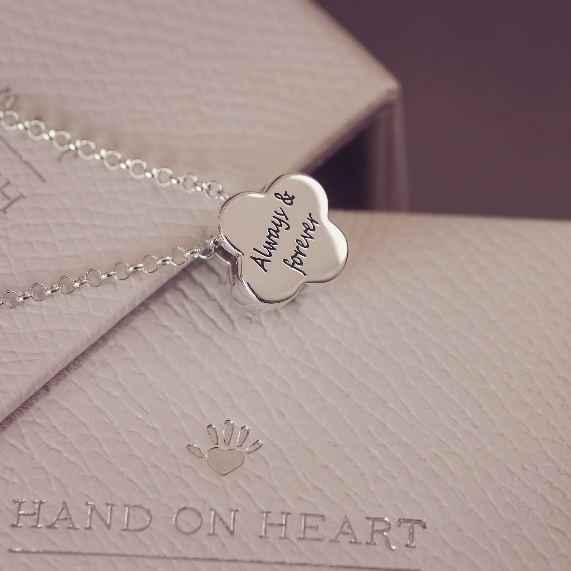Silver necklace with 'Always & forever' pendant on a 'Hand on Heart' branded box.