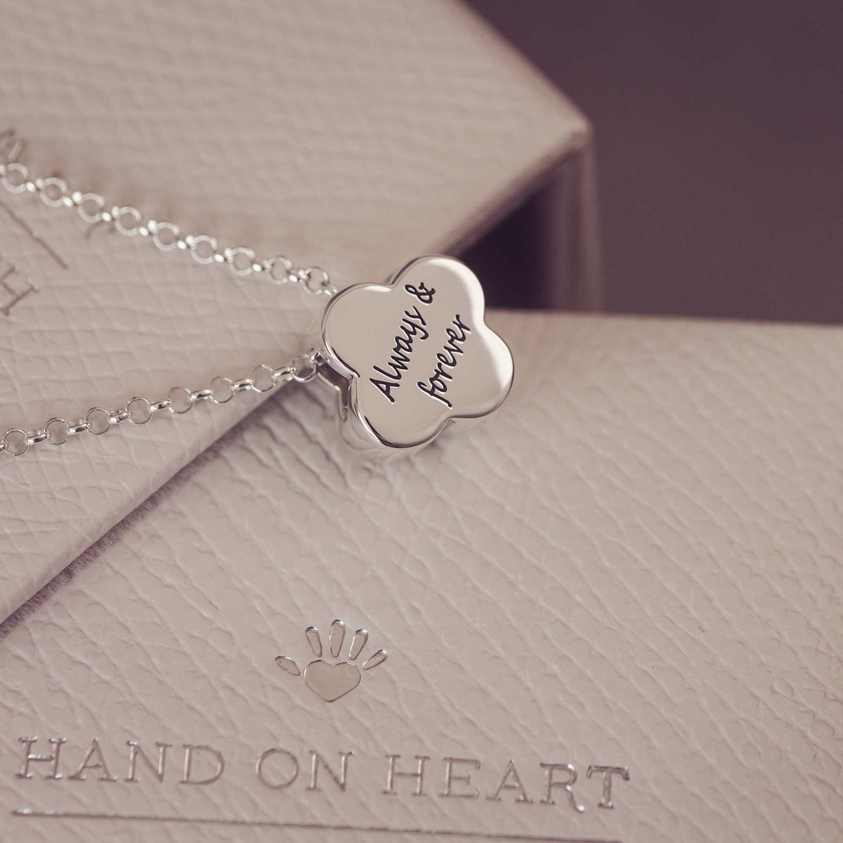 Silver necklace with 'Always & forever' pendant on a 'Hand on Heart' branded box.