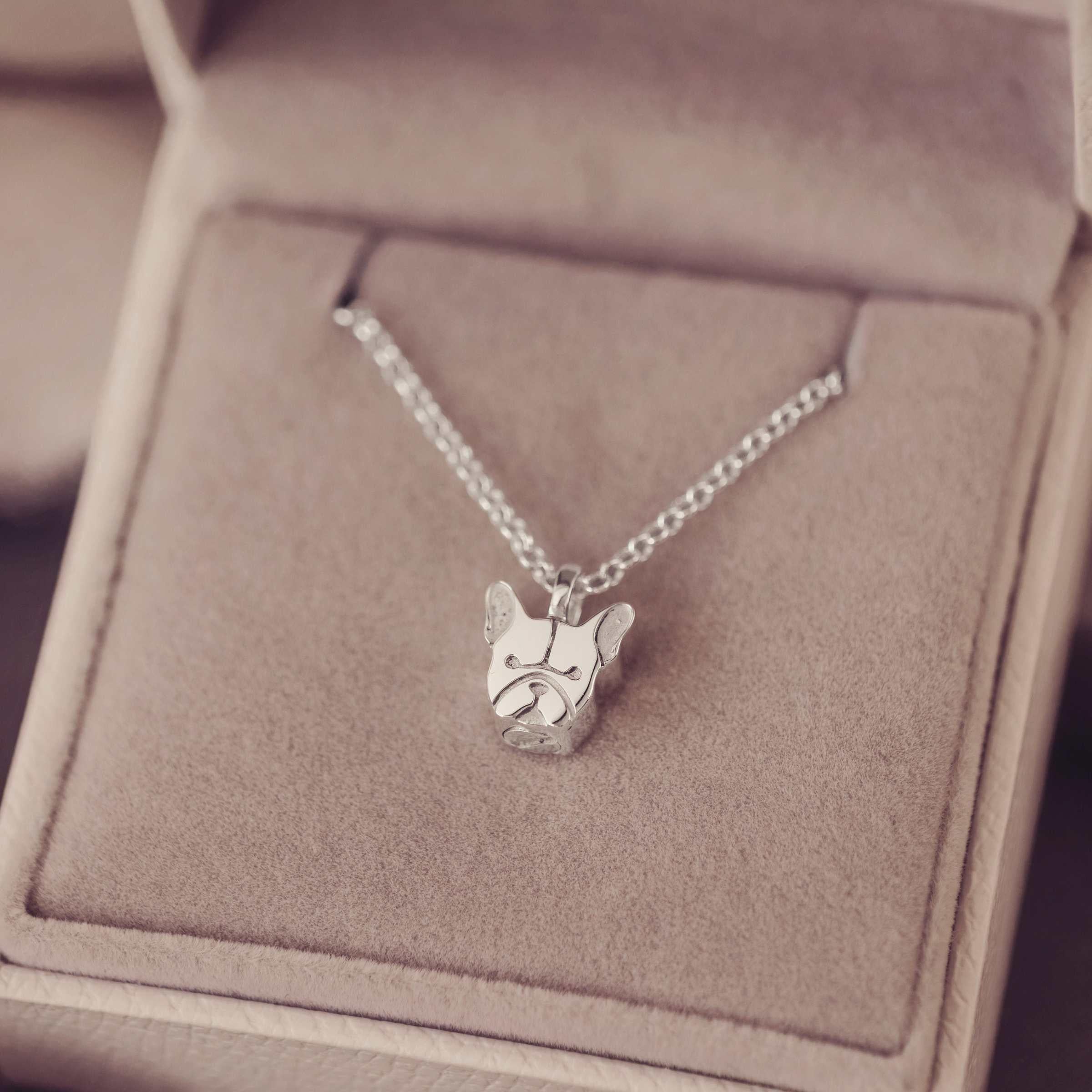 Silver dog-shaped frenchie pendant necklace in a jewellery box