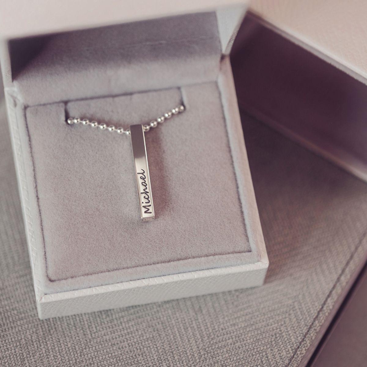 Silver necklace with a pendant in a jewelry box