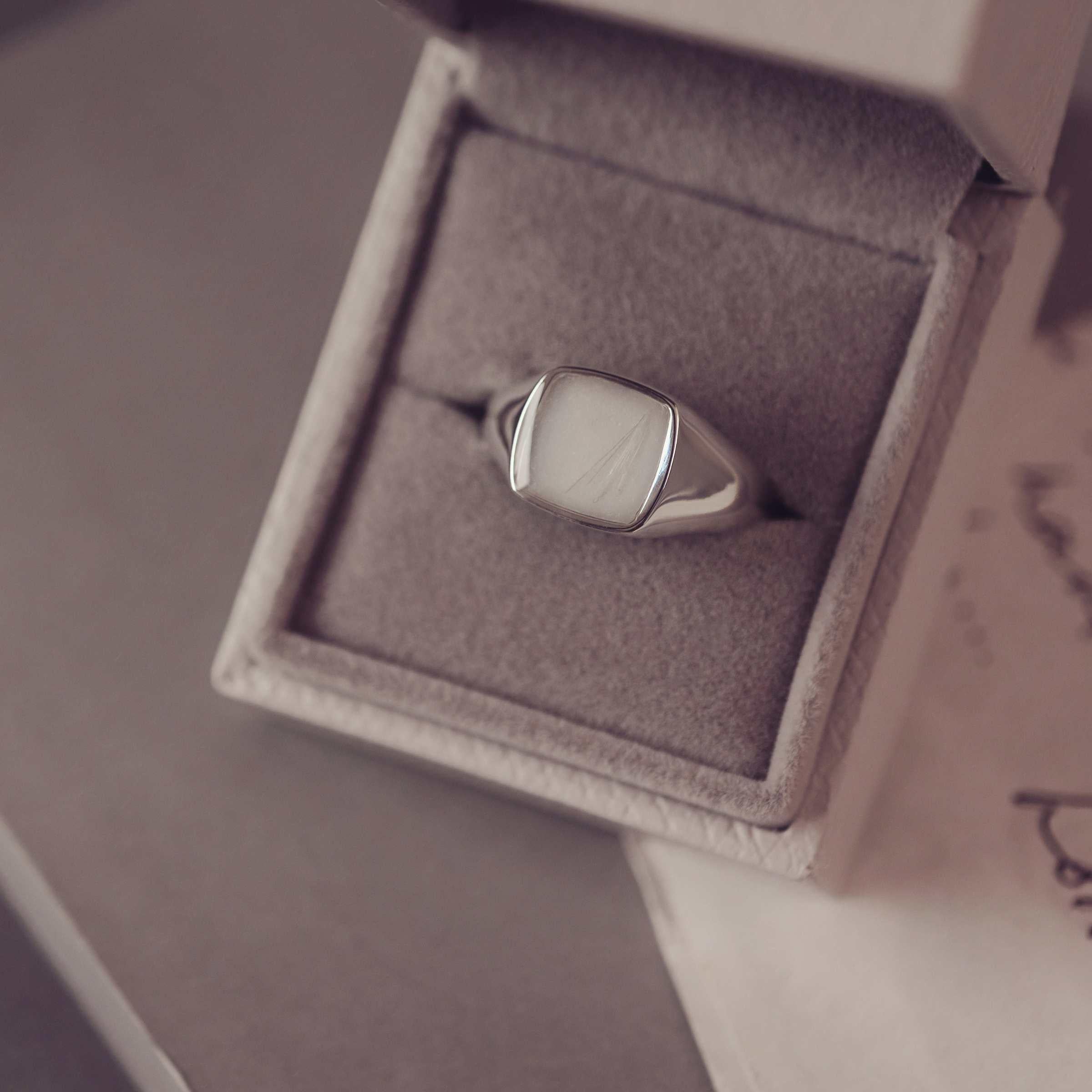 Cushion signet ring in a jewellery box