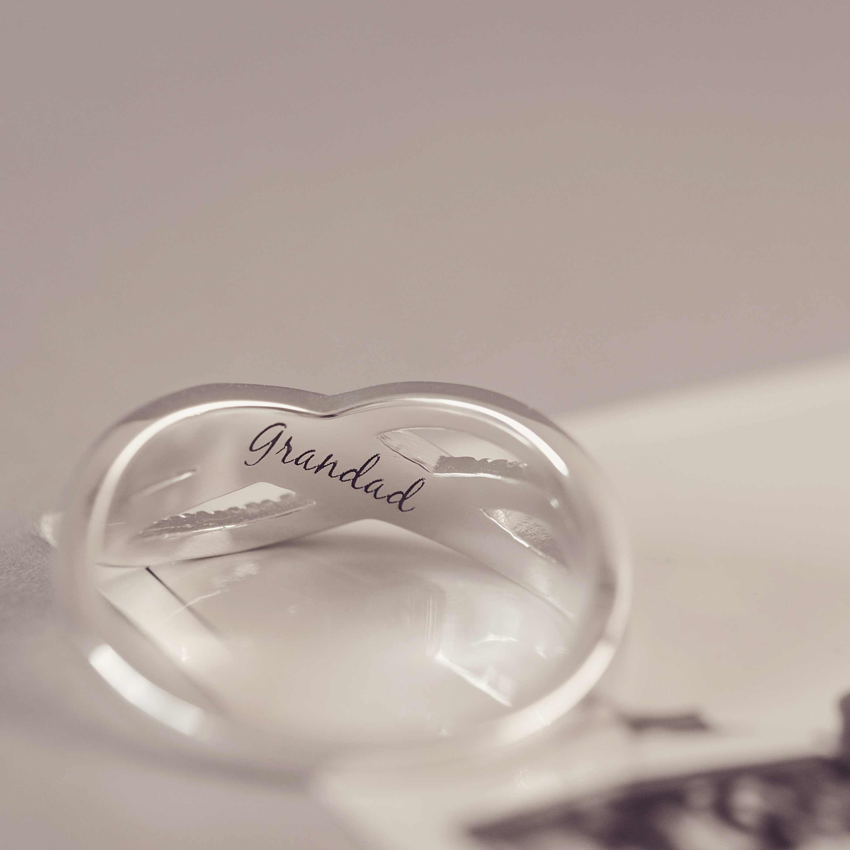 Silver ring with the engraving Grandad