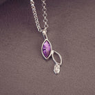 sterling silver necklace featuring gem stone, cremation ashes, purple crystal and resin
