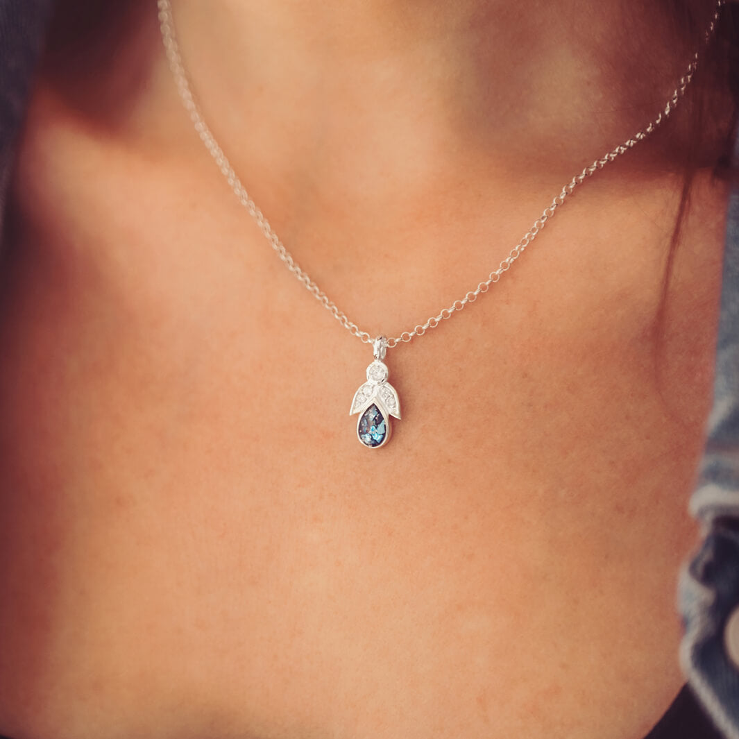 Sterling Silver Angel Pendant, containing cremation ashes and blue crystal
