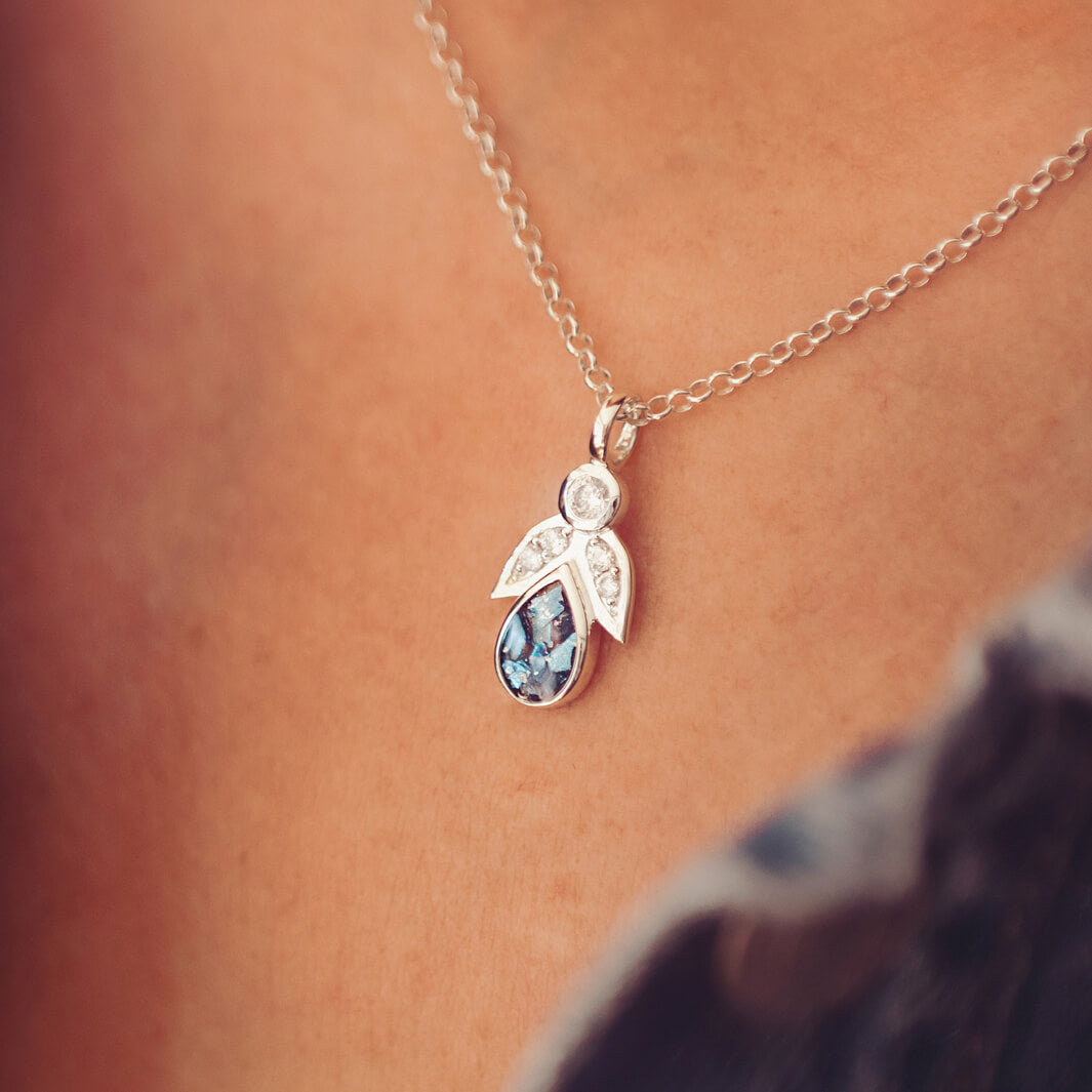 Sterling Silver Angel Pendant, containing cremation ashes and blue crystal