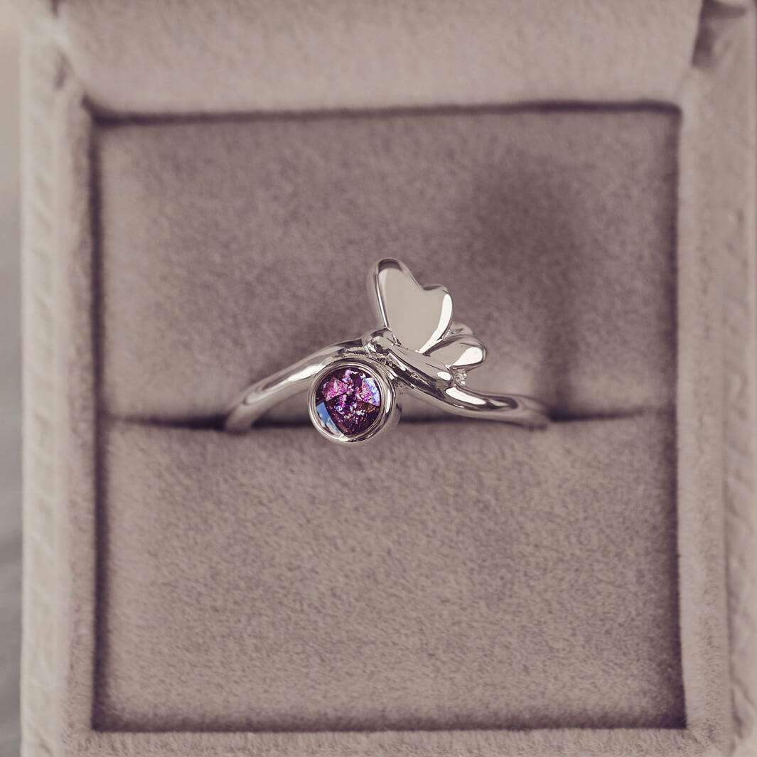 sterling silver butterfly necklace with a purple gemstone, created using cremation ashes