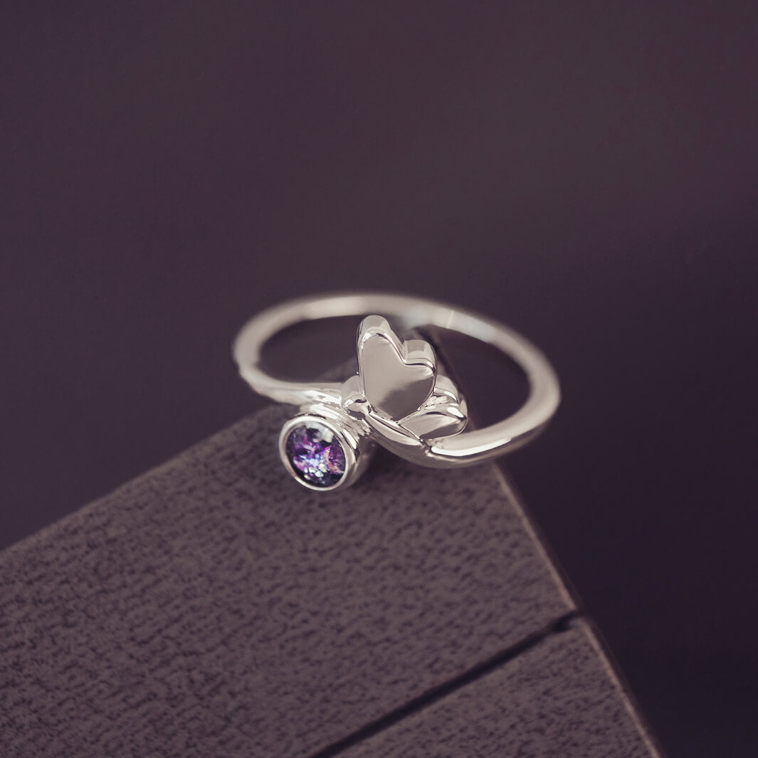 sterling silver butterfly necklace with a purple gemstone, created using cremation ashes