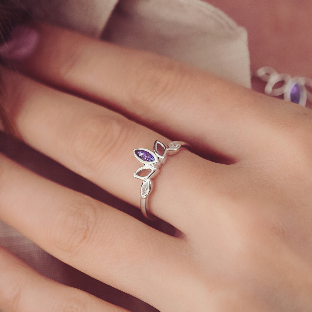 Cremation Ashes Marquis Style Ring, in purple, being worn on a ladies hand