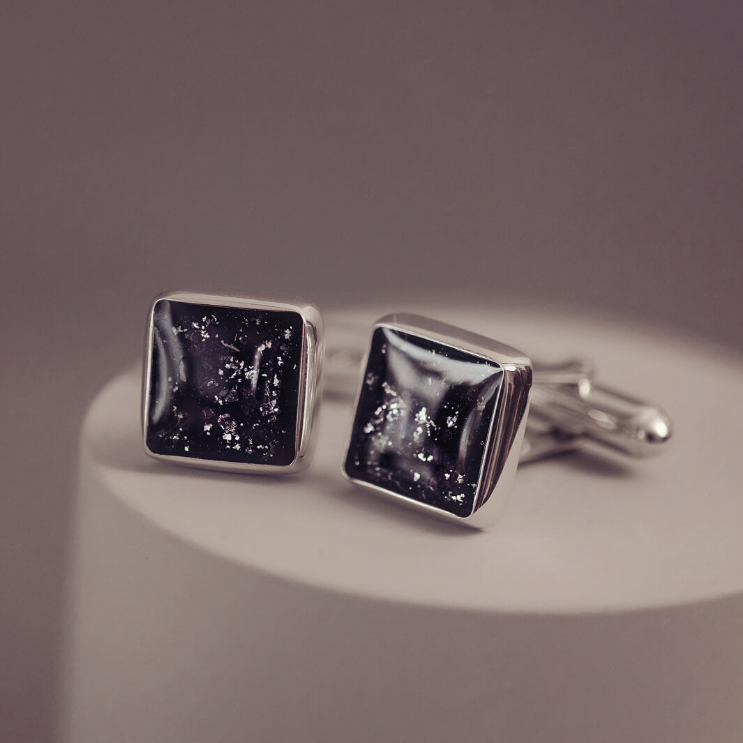 Square silver cufflinks containing cremation ashes, black crystal and resin