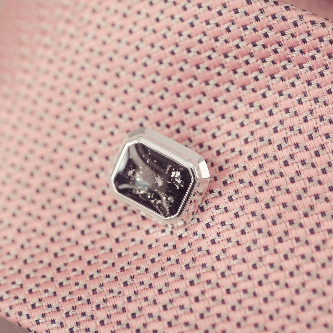 silver tie pin, created with black crystals, resin and cremation ashes. 