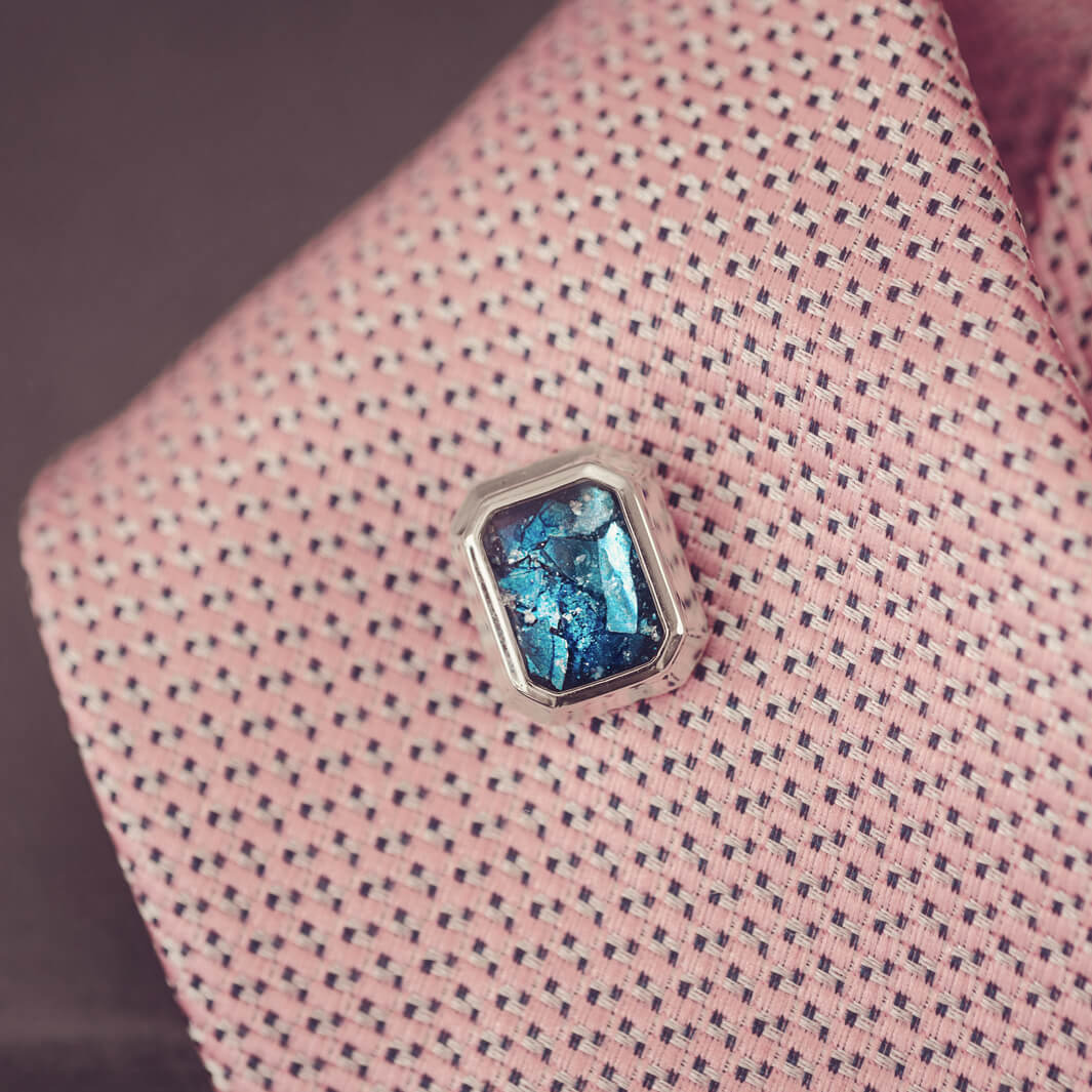 silver tie pin, created with blue crystals, resin and cremation ashes. 