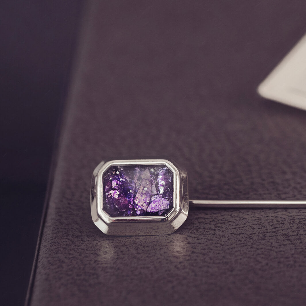 silver tie pin, created with purple crystals, resin and cremation ashes. 