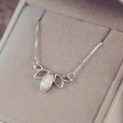 Sterling silver necklace in marquise style, with gem created from clear crystal, ashes and resin