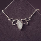 Sterling silver necklace in marquise style, with gem created from clear crystal, ashes and resin